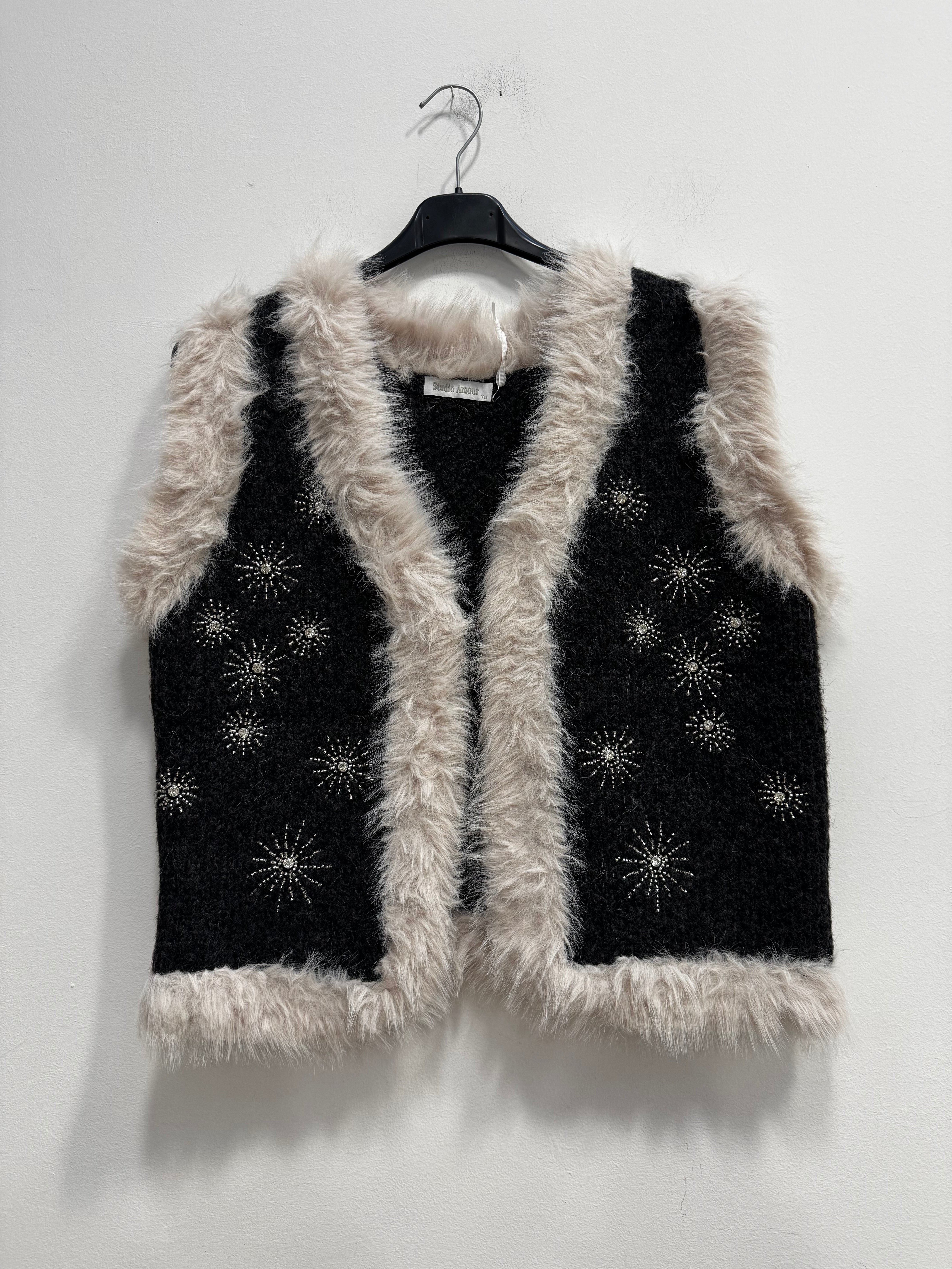 Peluche smanicato dettagli