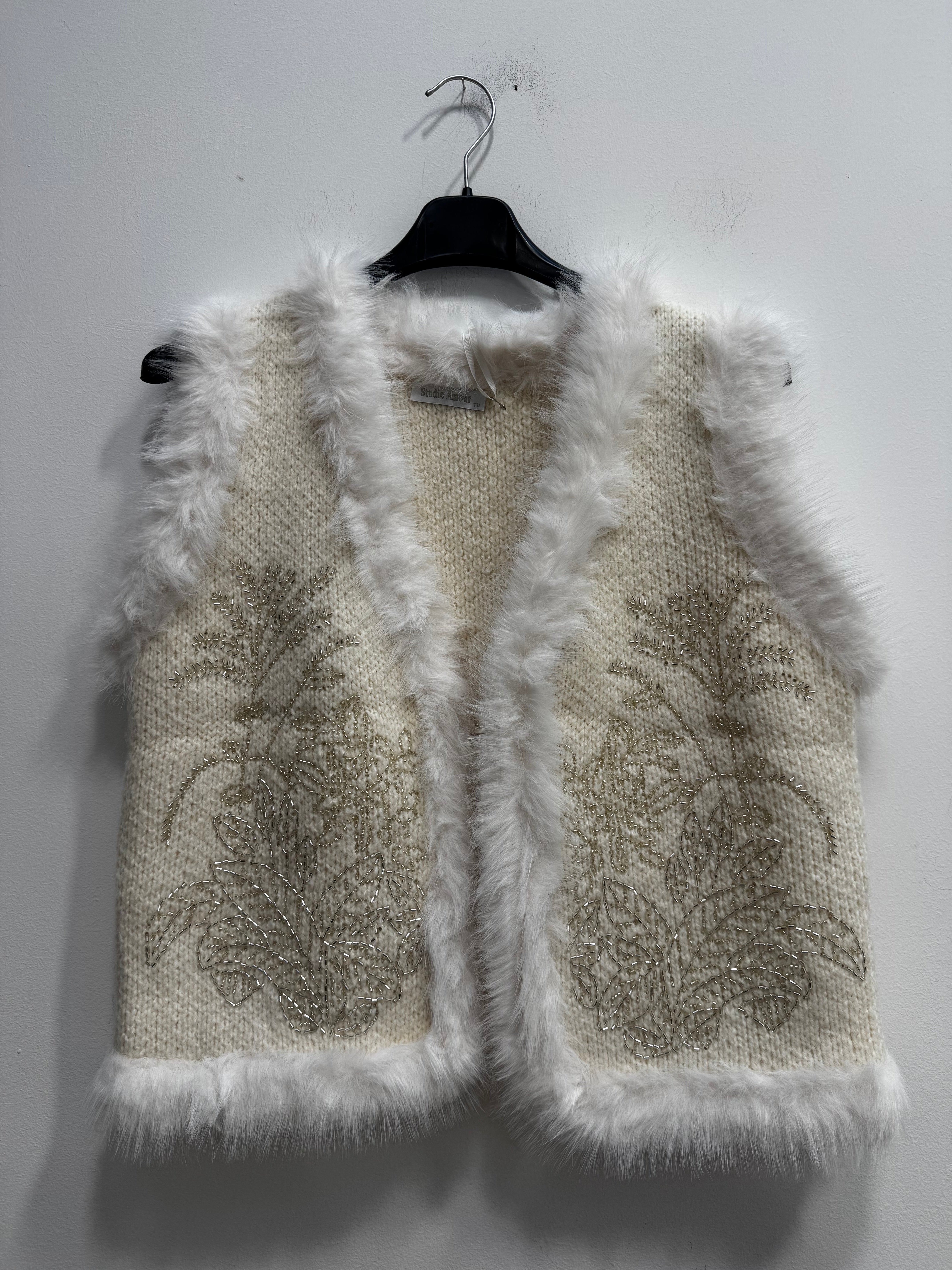 Peluche smanicato dettagli