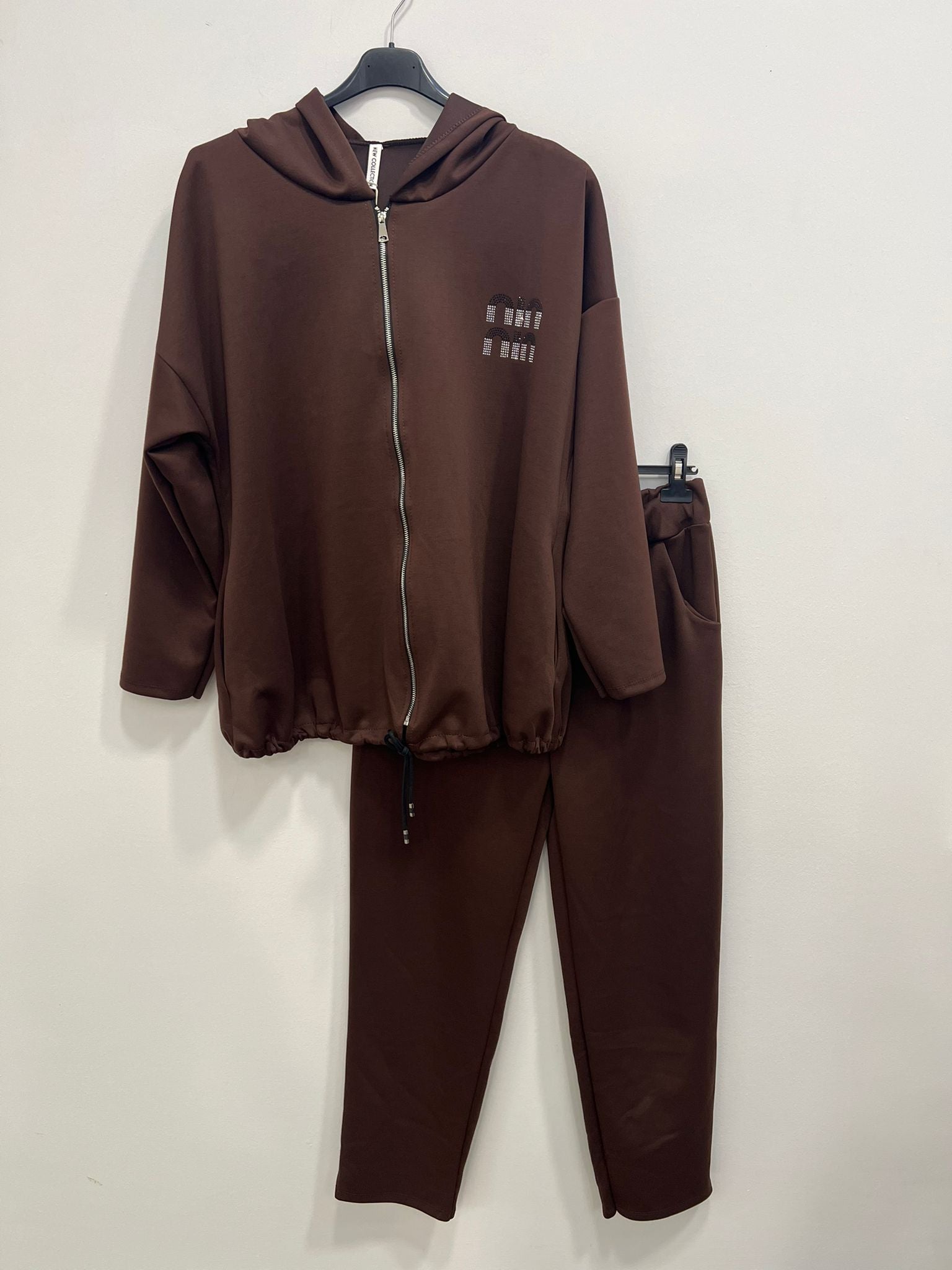 Tuta zip stile miu con cappuccio