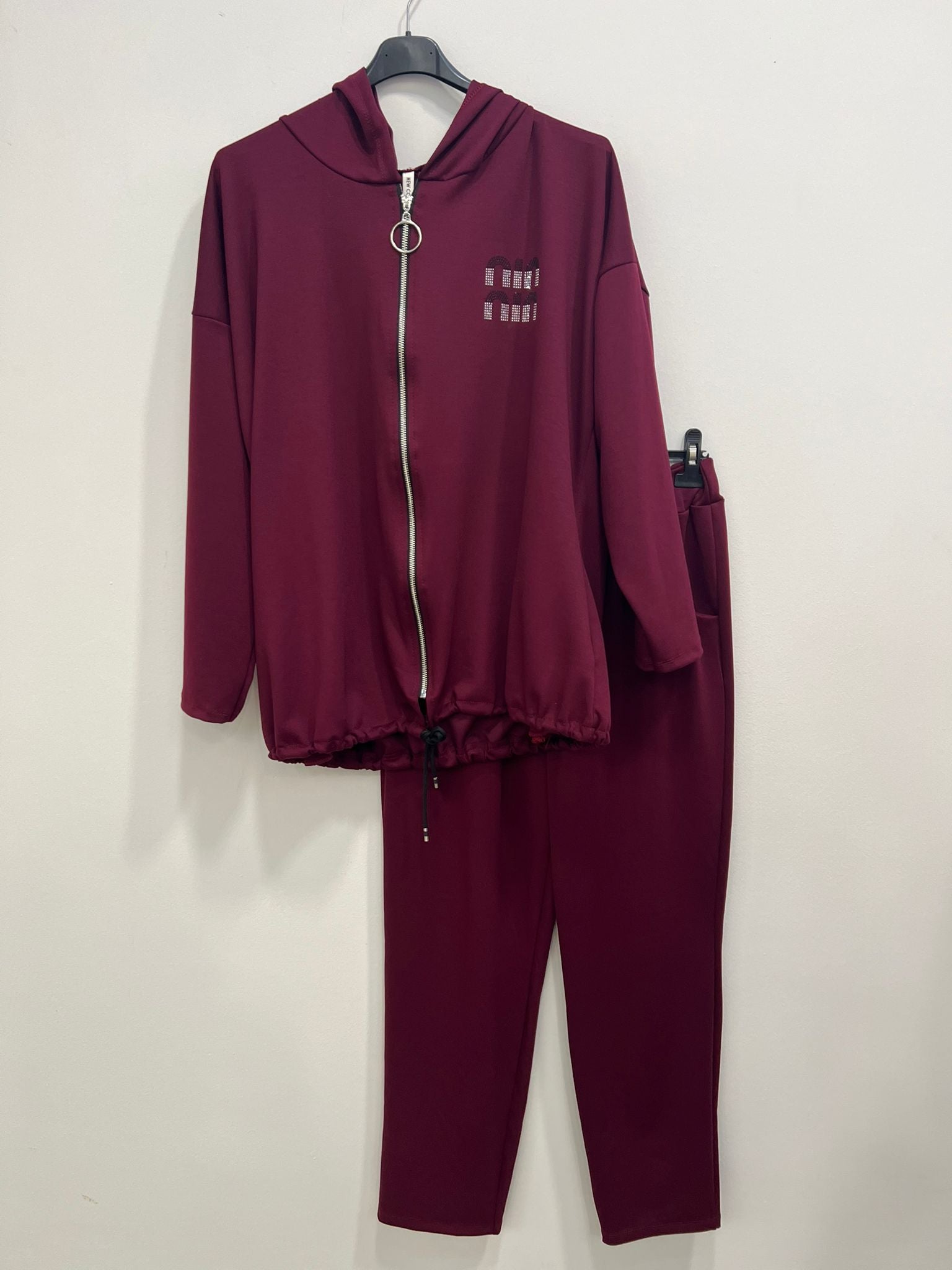 Tuta zip stile miu con cappuccio