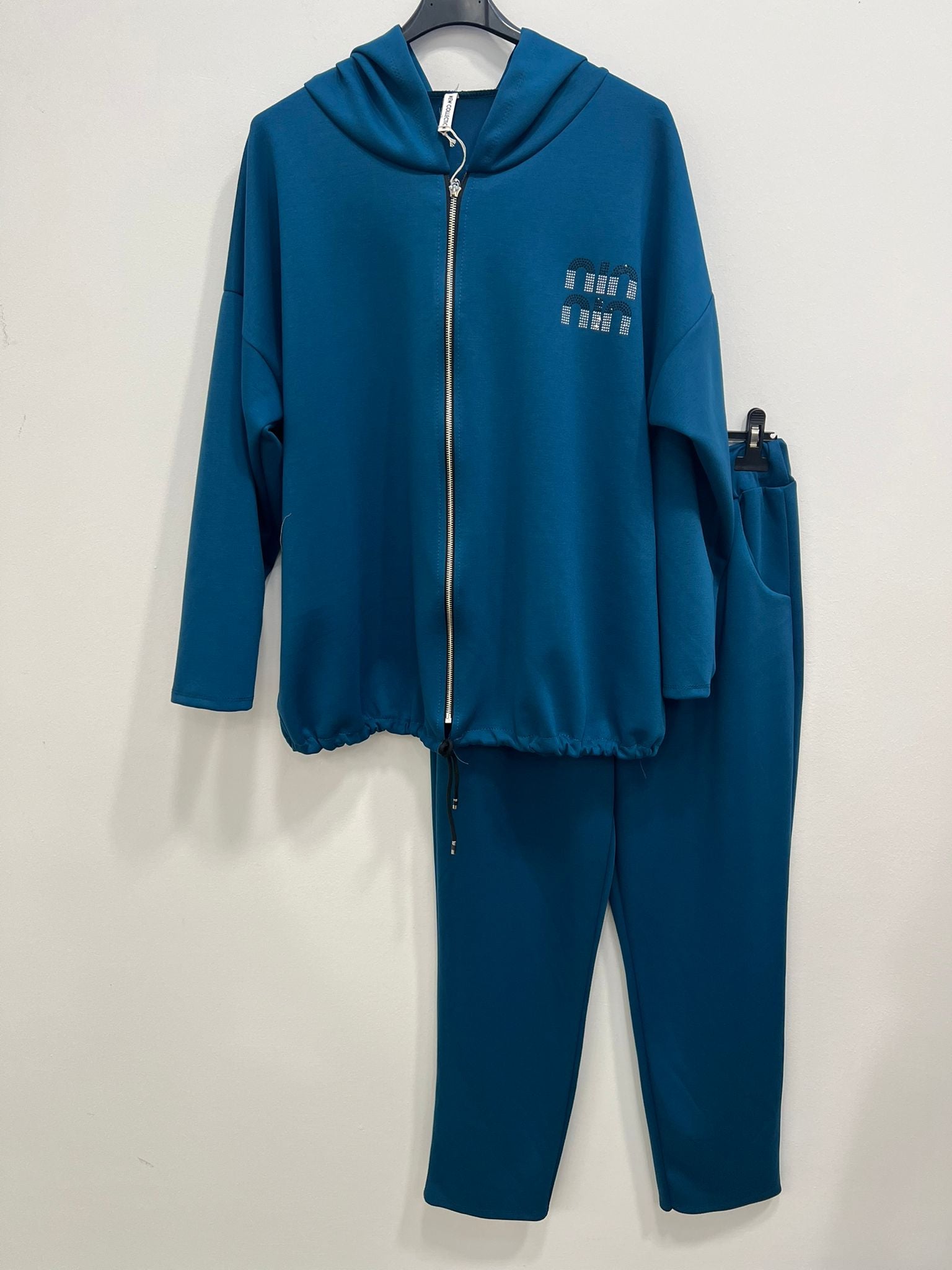 Tuta zip stile miu con cappuccio