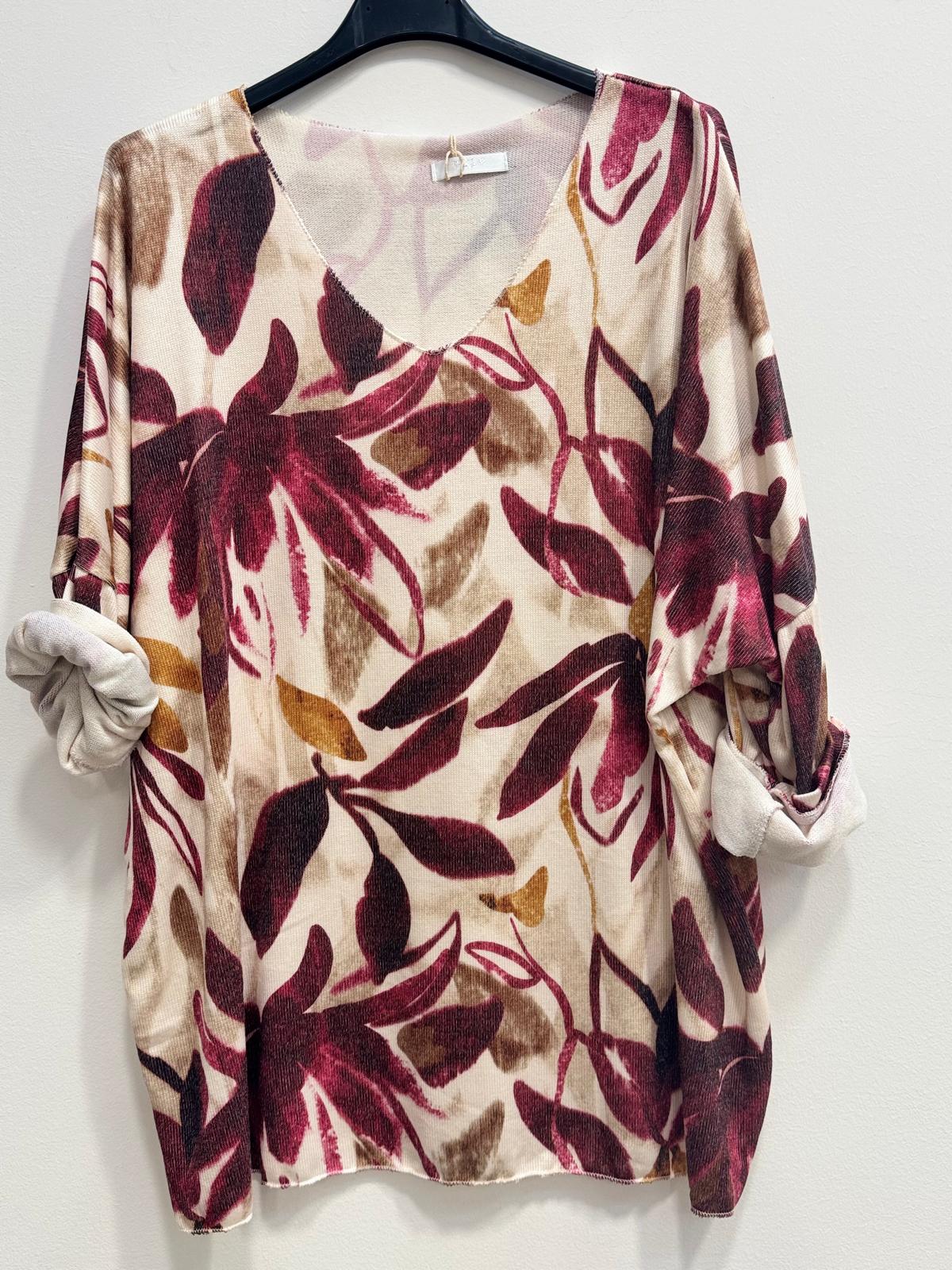Blusa fiorata in lana d'angora
