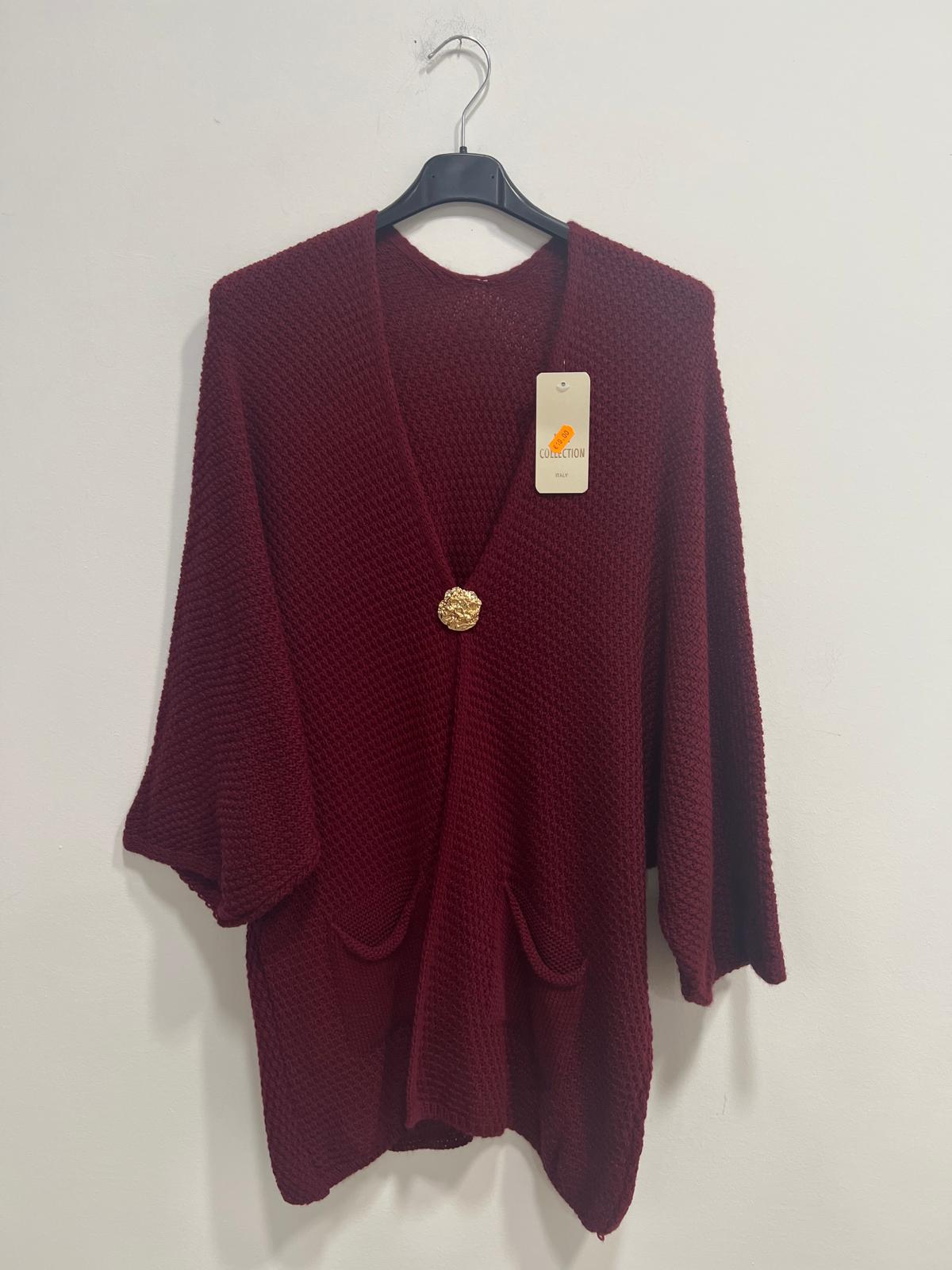 Cardigan spilla con tasche
