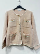 Cardigan peluche decorato