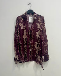 Blusa lurex fiorata