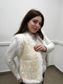 Peluche smanicato dettagli