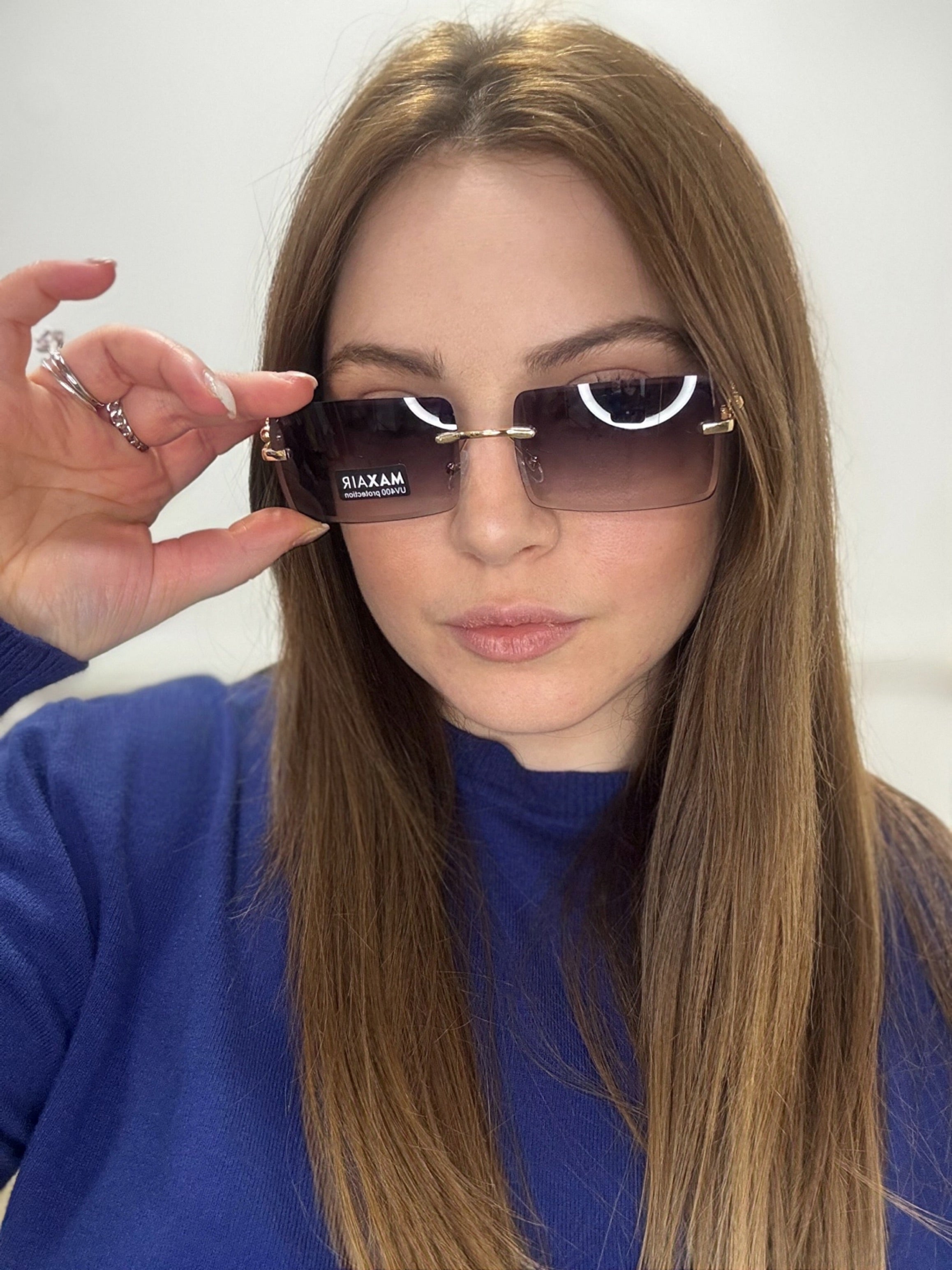 Occhiali da Sole Slim Rimless – Design Rettangolare Vintage anni 2000