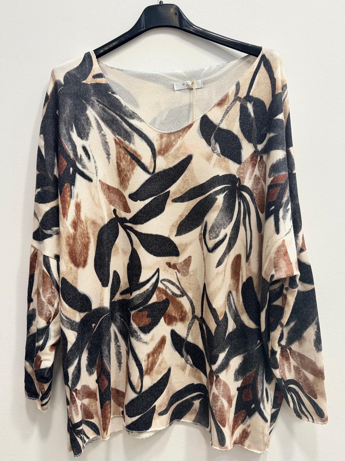 Blusa fiorata in lana d'angora