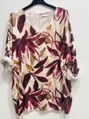 Blusa fiorata in lana d'angora