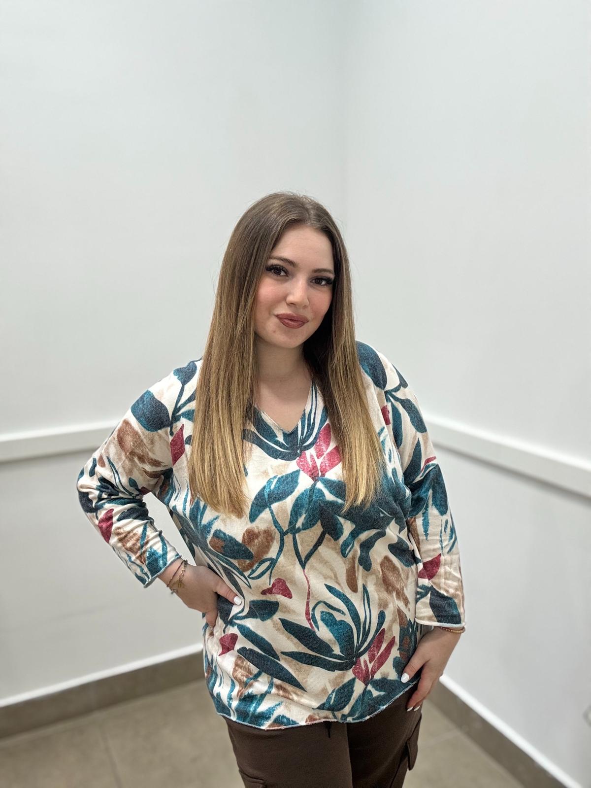 Blusa fiorata in lana d'angora