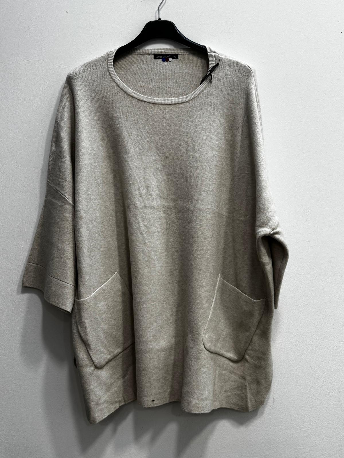 Blusa morbida modal con tasche