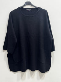 Blusa morbida modal con tasche