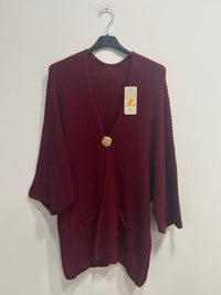 Cardigan spilla con tasche