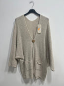 Cardigan spilla con tasche